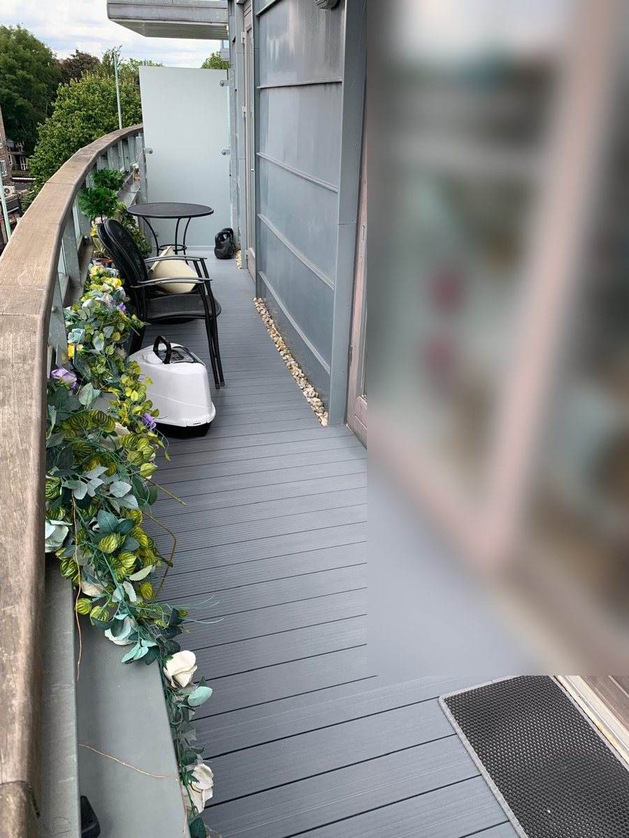Completed Alideck aluminium decking on a residential balcony back in use